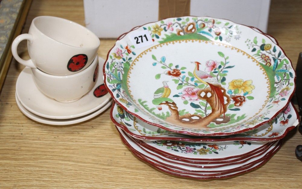 A pair of Moorcroft tea cups and saucers, with floral mons decoration and a Copeland Spode eight piece part dessert service